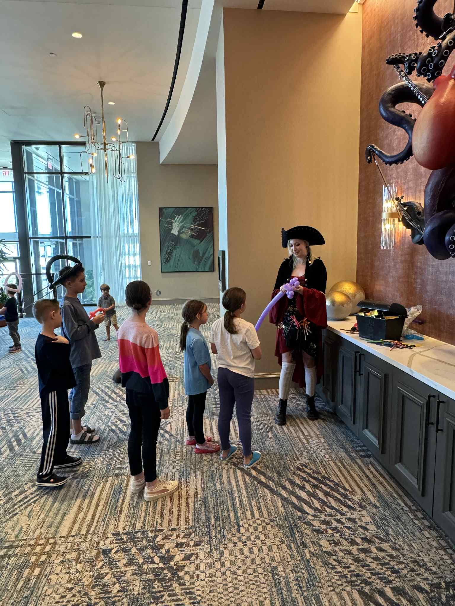 Virginia Beach clown and juggler from Whimsy Entertainment performing circus-style kids party entertainment with bright costumes, balloon animals, giant bubbles and silly interactive fun for families and event planners in Virginia.