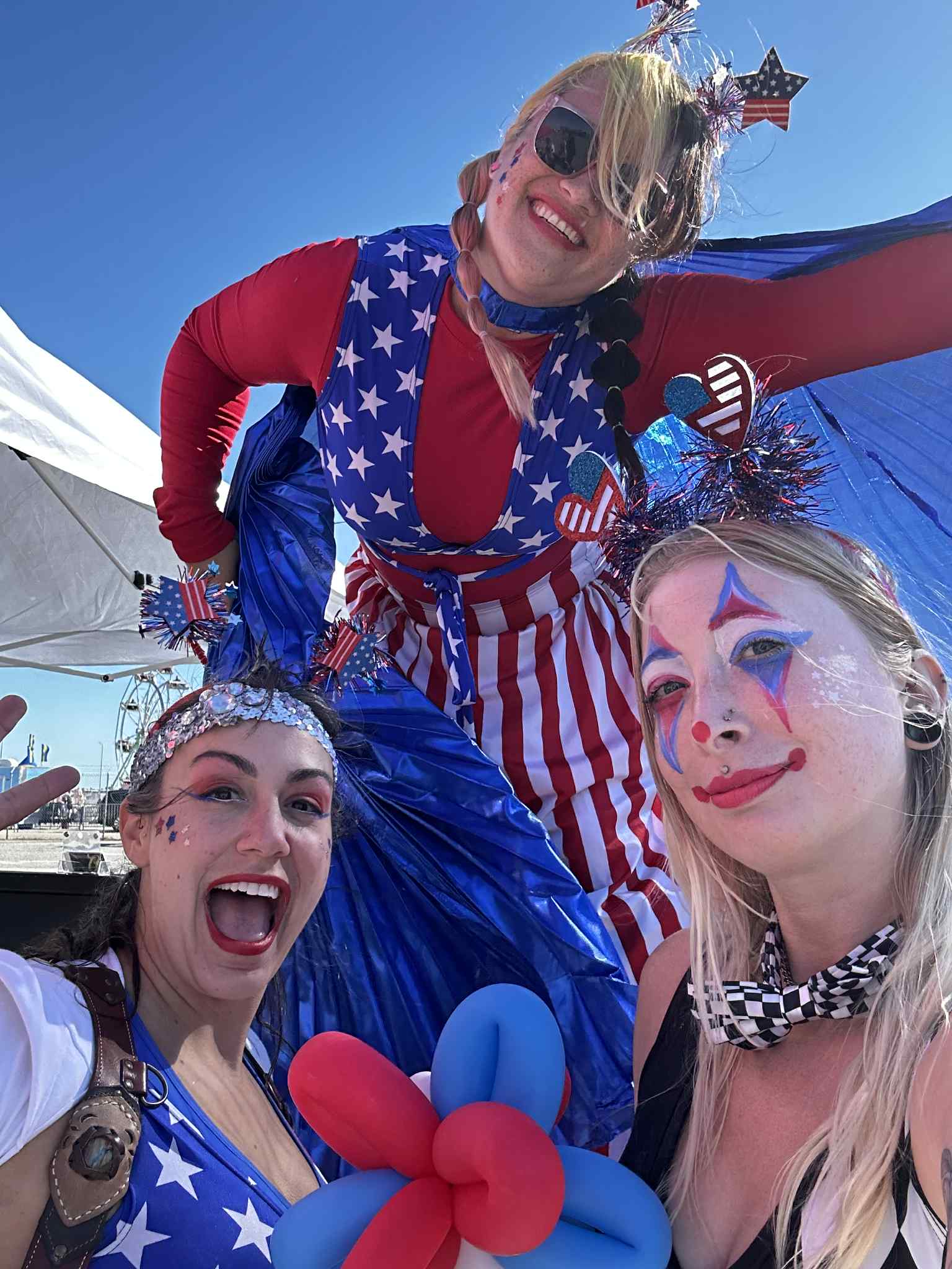 Circus clown and juggler Saria “Blu” Braska performing interactive kids party entertainment with juggling, miming and playful clowning for families, parents and event planners in Virginia.